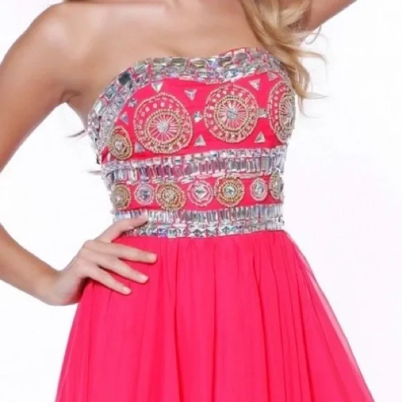 This beautiful formal dress is baby pink and a size extra small! - Picture 3 of 6